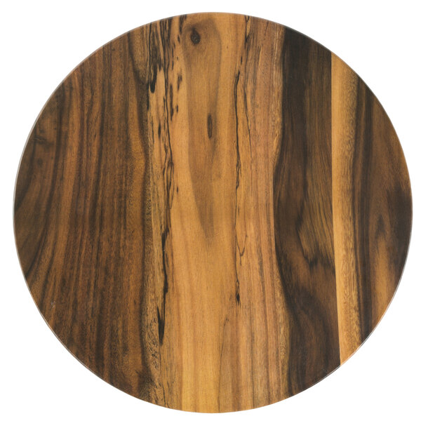 An American Metalcraft round melamine serving board with a faux acacia wood surface.
