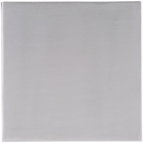 A stainless steel rectangular riser with a black border on a white surface.