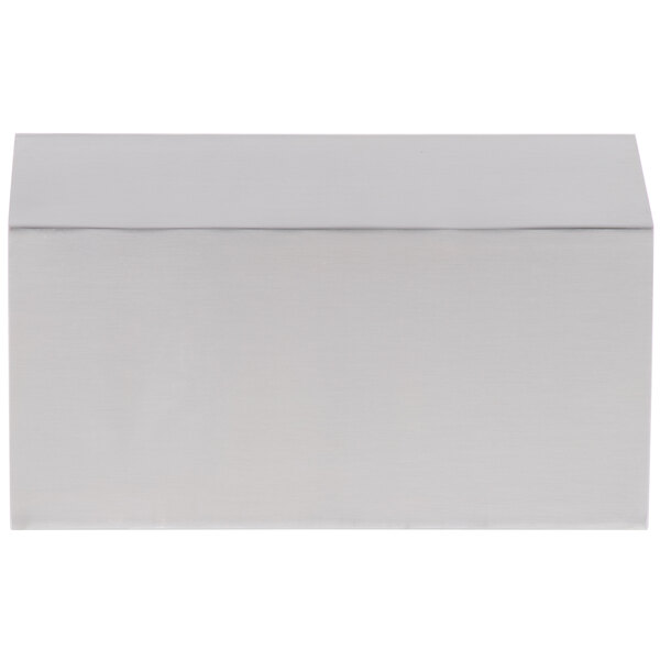 An American Metalcraft stainless steel rectangular riser on a white counter.