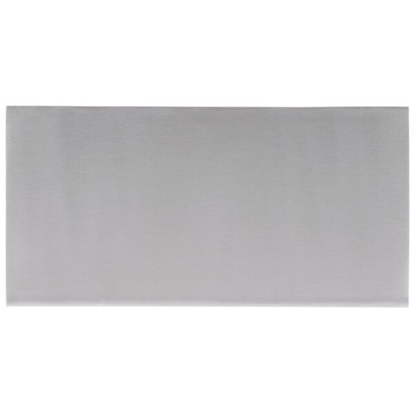 An American Metalcraft stainless steel rectangular riser on a white surface.