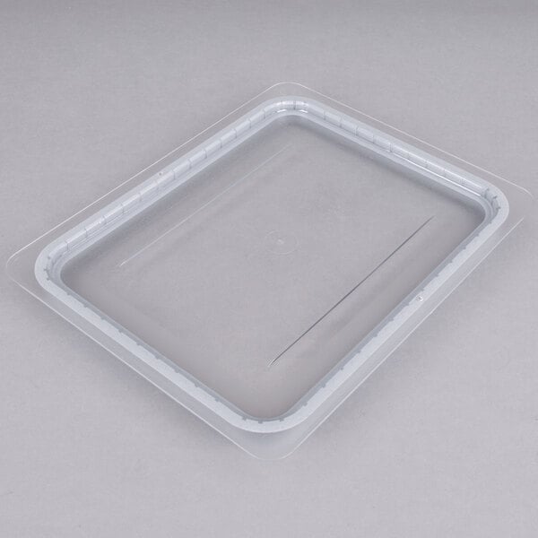 A Cambro clear plastic GripLid on a plastic container.