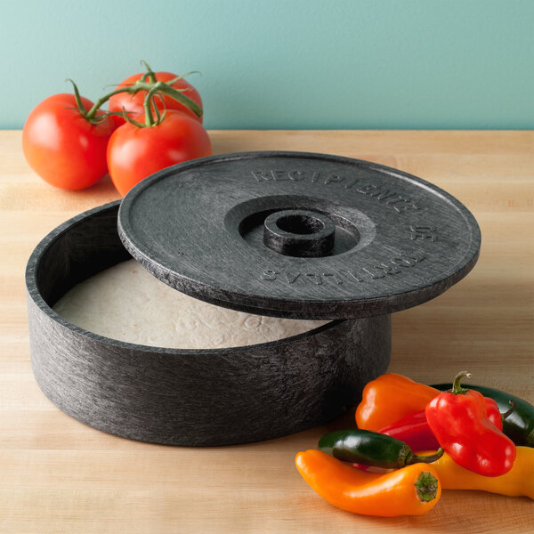 a group of tomatoes on a table
