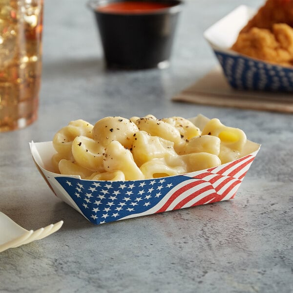 A container of macaroni and cheese with a red, white, and blue USA flag design.