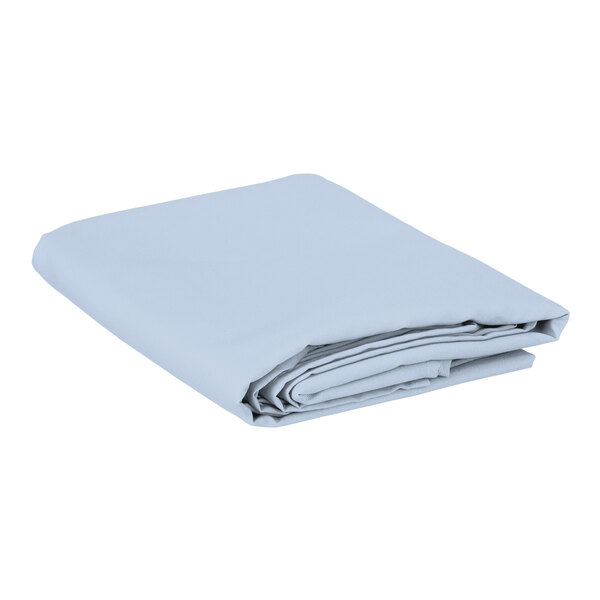 A folded light blue rectangular table cover on a white background.