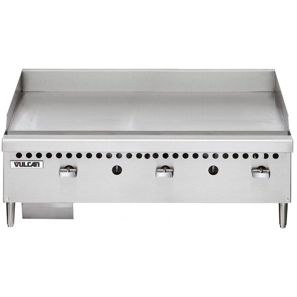 A Vulcan stainless steel gas countertop griddle with manual controls.