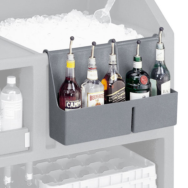 A gray Cambro speed rail holding bottles of liquor on a counter.