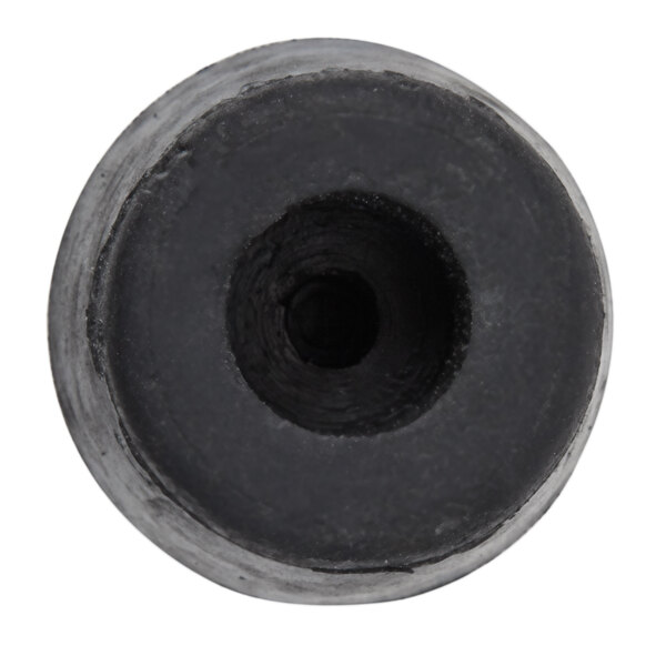 A black rubber cylinder with a hole in it.