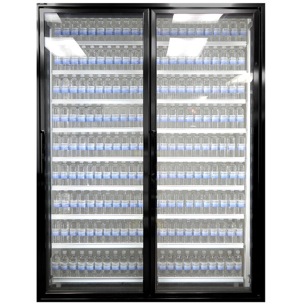 Styleline Classic Plus glass walk-in cooler doors with shelving filled with water bottles.