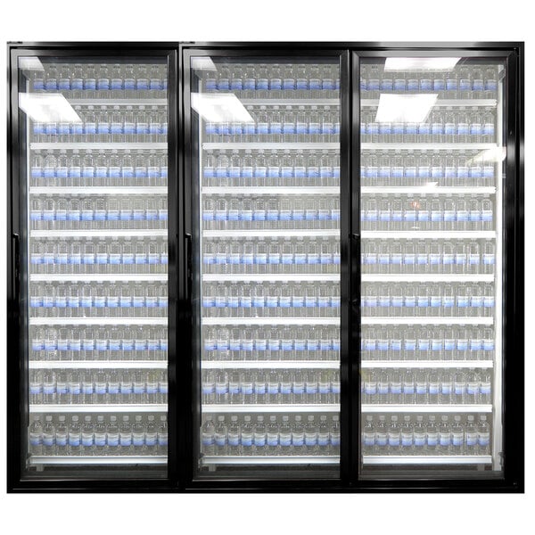 Styleline walk-in cooler doors with shelving filled with water bottles.