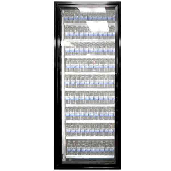 A Styleline black glass walk-in cooler door with shelving holding water bottles.