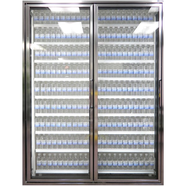 A Styleline walk-in cooler merchandiser door with shelving holding water bottles.