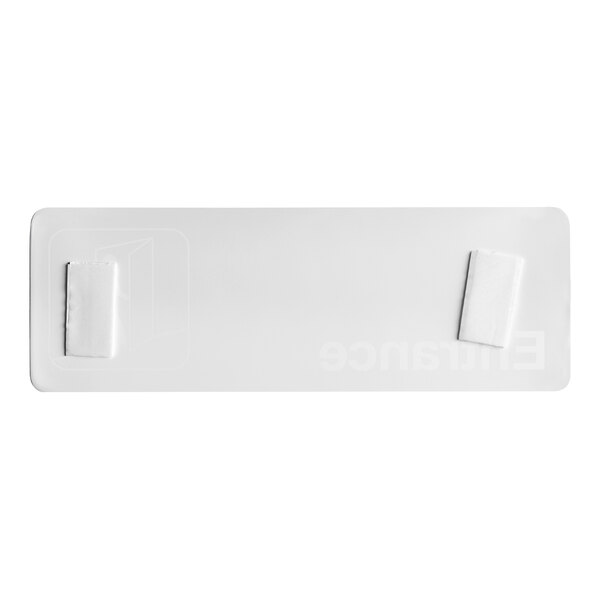 A white rectangular sign with black text that reads "Entrance" and "Thunder Group"