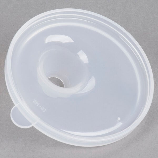 A clear plastic lid with a single opening on a white background.