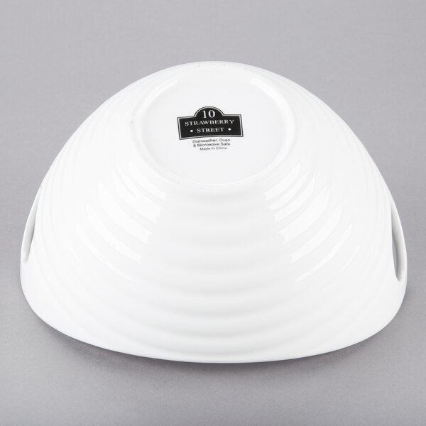 A white 10 Strawberry Street porcelain boat bowl with ribbed texture.