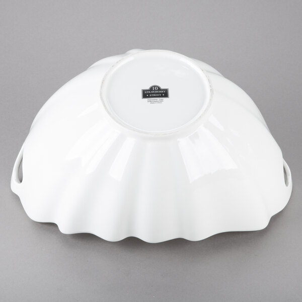 A white porcelain boat bowl with a wave texture.