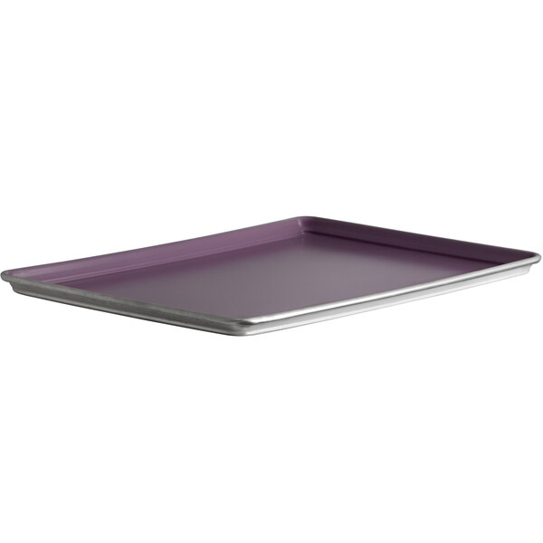 A purple rectangular tray with a silver rim.