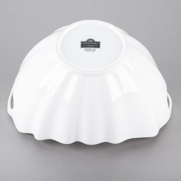 A white porcelain boat bowl with a wave texture.