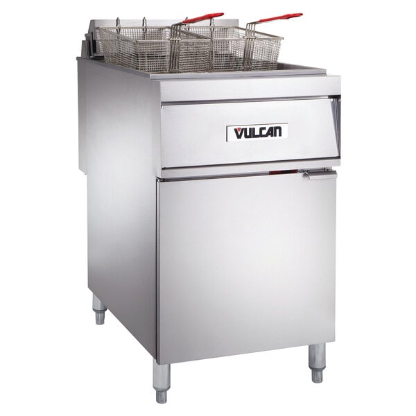 A Vulcan electric floor fryer with baskets on a commercial kitchen floor.