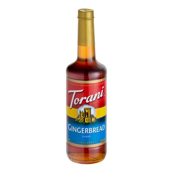 A Torani 750 mL glass bottle of gingerbread syrup with a yellow cap.