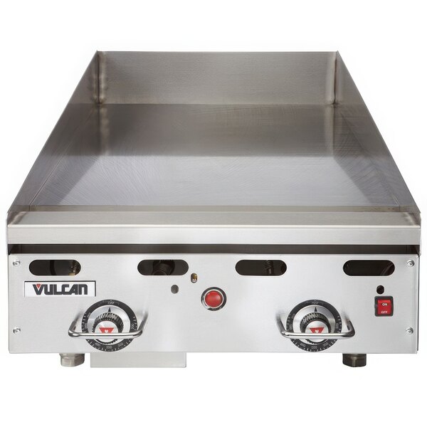 A close-up of a Vulcan natural gas commercial griddle on a counter.