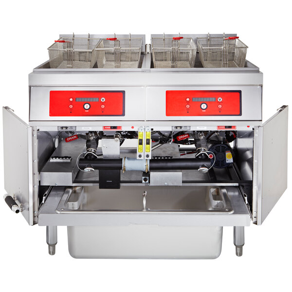 A large Vulcan electric floor fryer system with red and black containers.