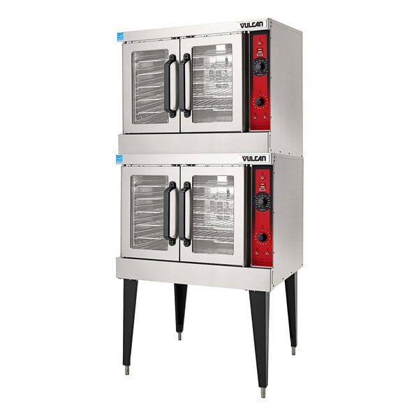 A stack of stainless steel Vulcan double deck electric convection ovens.