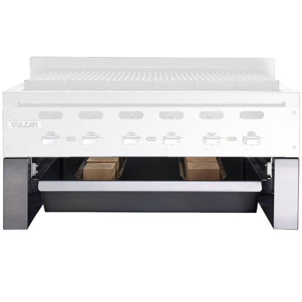 A white Vulcan Achiever smoker base with three wood drawers.