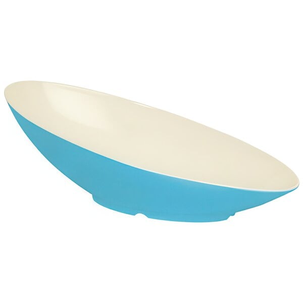 A blue and white oval slanted melamine bowl.