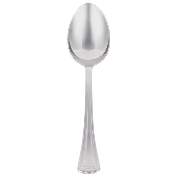 A silver spoon with an egg shaped handle.