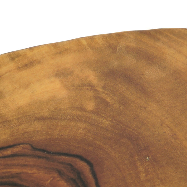 An oval melamine serving board with a faux olive wood surface.