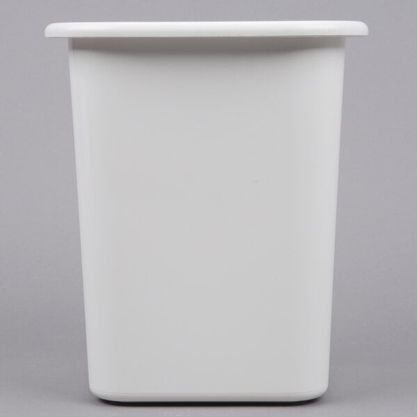 A white plastic Carlisle chiller pan with a lid.