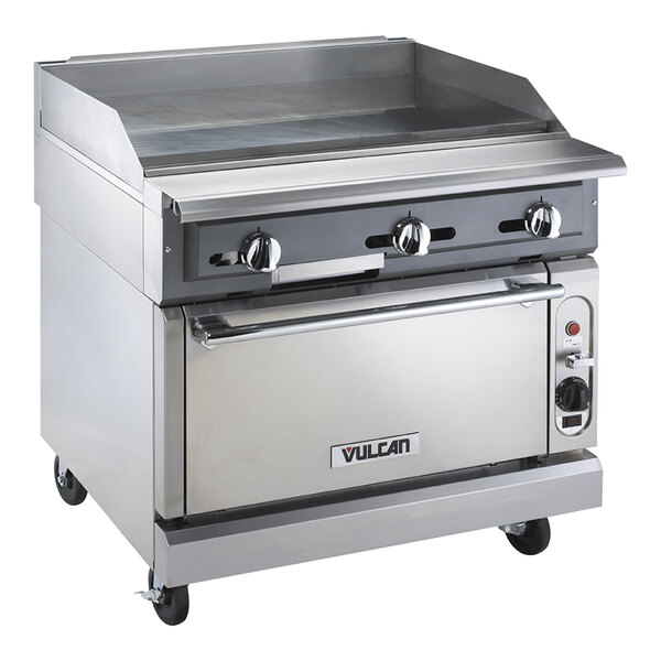 A Vulcan stainless steel liquid propane range with a griddle top on wheels.