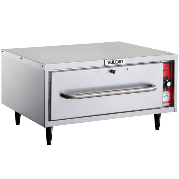 A silver rectangular Vulcan drawer warmer on a counter.