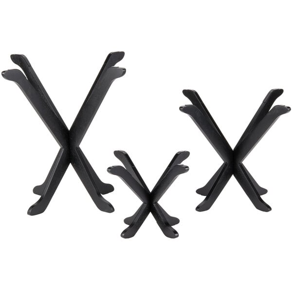 A black metal Tablecraft 3-piece fold-away riser set with x-shaped stands.