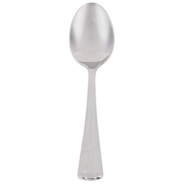A Libbey stainless steel teaspoon with a white handle.