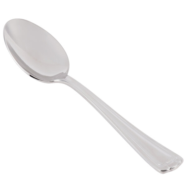 A close-up of a Libbey stainless steel teaspoon with a handle.