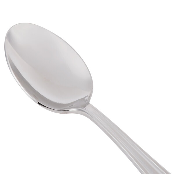 A Libbey stainless steel teaspoon with a silver handle.