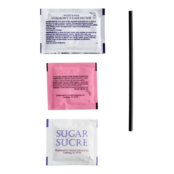 A single serving hot beverage condiment kit containing a packet of whitener, a packet of sugar substitute, a packet of sugar, and a black stirrer.