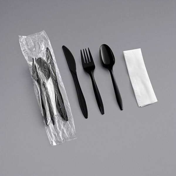 Choice Medium Weight Black Wrapped Plastic Cutlery Set with Napkin and Salt  and Pepper Packets - 250/Case