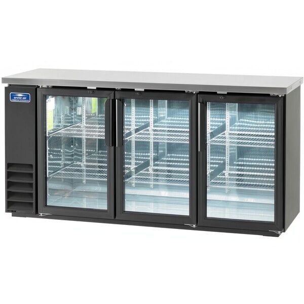 An Arctic Air black back bar refrigerator with glass doors.