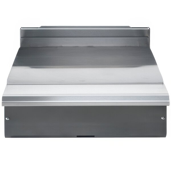 A close-up of a metal shelf on a Vulcan VWT24 modular spreader plate.