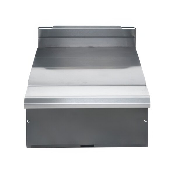 A stainless steel counter top with a Vulcan VWT18 spreader plate on top.
