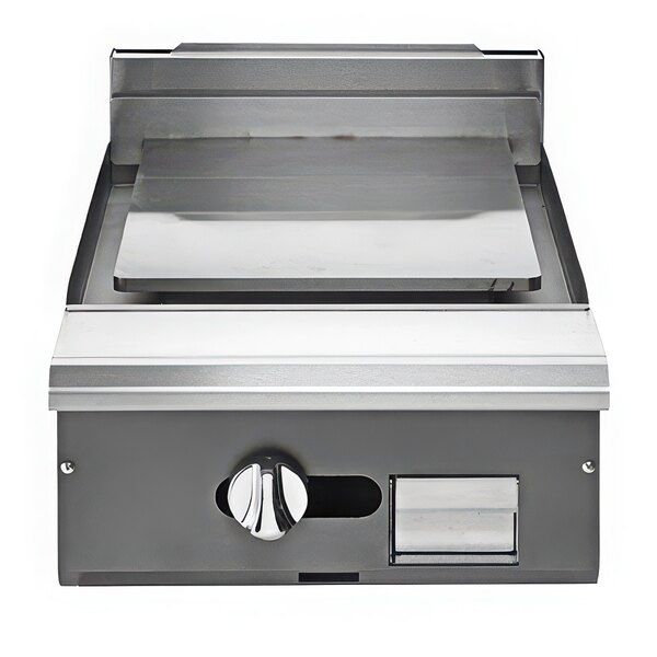 A Vulcan stainless steel heavy-duty modular plancha range with a lid on a counter.