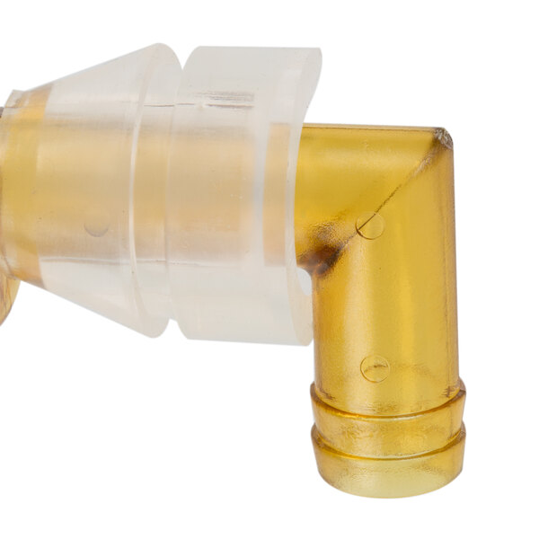 A yellow plastic pipe with a plastic sleeve and plastic tube.