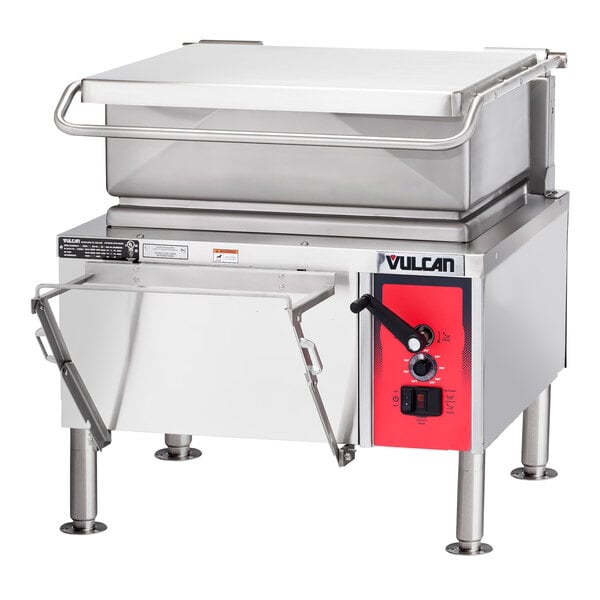 A Vulcan natural gas tilt skillet on a stainless steel kitchen counter.