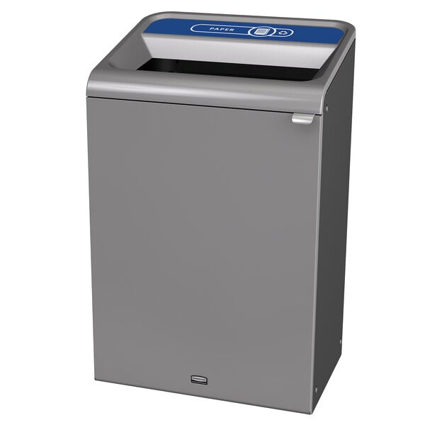 A grey rectangular Rubbermaid recycling container with a black lid.