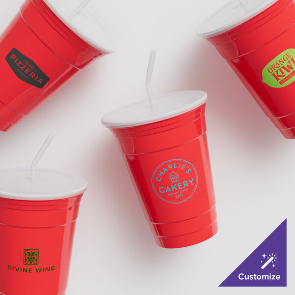 A group of red GET plastic tumblers with white lids and straws.
