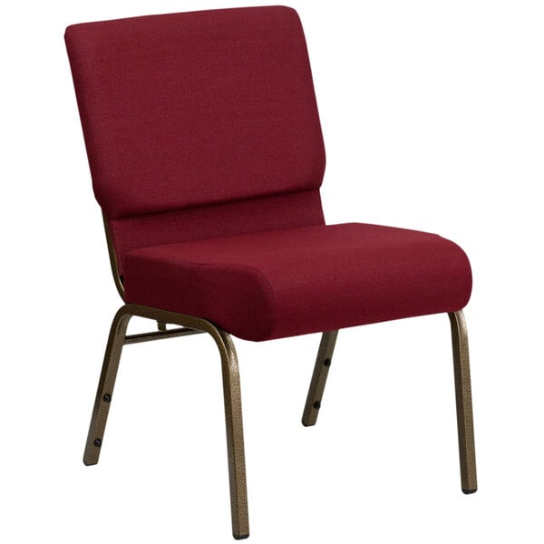 A burgundy church chair with a gold frame.