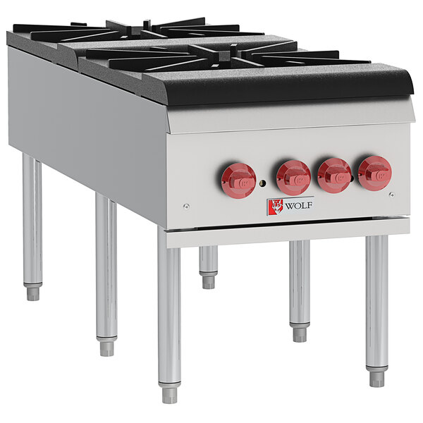 A Wolf stainless steel liquid propane countertop stock pot range with two burners and four knobs.