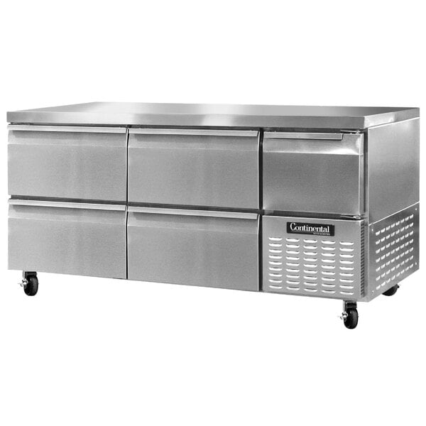 A large stainless steel Continental Refrigerator undercounter refrigerator with four drawers and one half door.